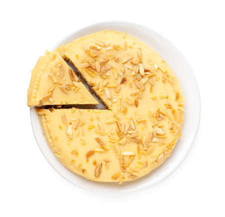 Top view of piece of sweet pie on a white plateの写真素材