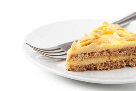 Closeup view of piece of sweet pie on a white plateの写真素材