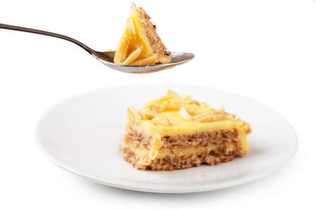 Closeup view of piece of sweet pie in a spoonの写真素材