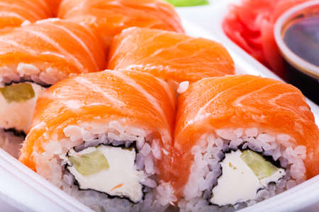 Sushi, soy and ginger on a white plateの写真素材