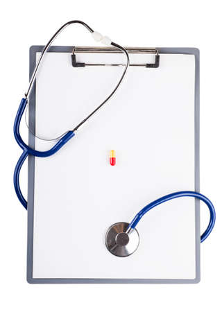 Blank sheet and stethoscope over white backgroundの写真素材
