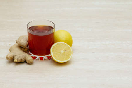 drinks of different colours and textures in glass cups on table on  light background. A place for a label. Copyspaceの写真素材