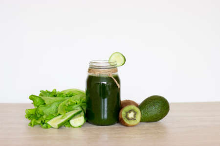 Vegetable smoothies green. The concept of diet, detox, vegetarianism and a healthy lifestyle.の写真素材