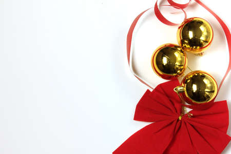 ornamentation and christmas decoration composing frame with white backgroundの写真素材