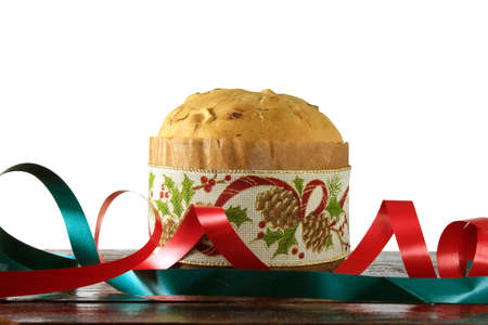 Panettone, Decorative Food, On Wooden Table, White Background, Front Viewの写真素材