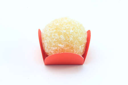 coconut kiss (beijinho de coco) - typical sweet Brazilian cuisine isolated on white background. Clouseup Photographyの写真素材