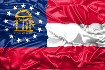Flag of Georgia state of United States of America on soft and smooth silk texture. 3D renderingの写真素材