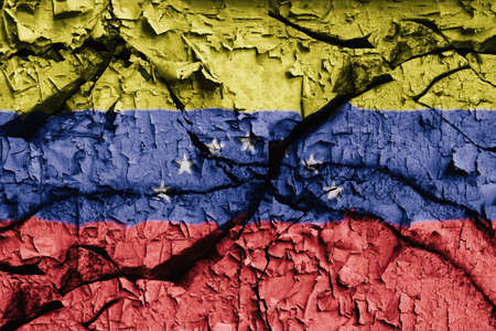 Venezuela, political, economic and social crisis of dictatorial regime that is in global conflict. Flag of Venezuela and Venezuelans fighting for their freedomの写真素材
