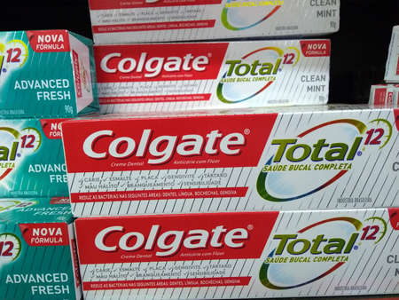 RIO DE JANEIRO, BRAZIL - DECEMBER 27, 2019: Colgate Toothpaste, a brand of oral care products on the supermarket shelf.のeditorial素材