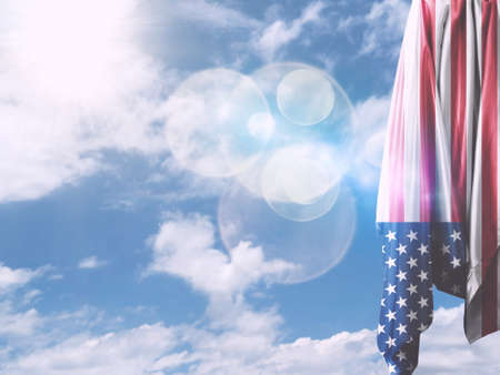 Sky Raised United States (USA) Flag, Symbol of American People's Patriotismの写真素材