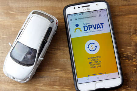 Rio de Janeiro, Brazil - February 9, 2020: DPVAT logo on the Smartphone screen. It is mandatory...