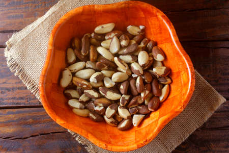 Chestnuts from Para or Brazil nuts, in Portuguese: Brazil nuts or Brazil nuts, in the bowl on a...