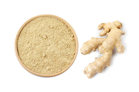 Raw ginger ground powder isolated on white background. Anti-inflammatory and antioxidantの写真素材