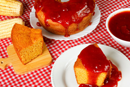 Homemade corn cake with guava paste on a table, selective focus, Typical Brazilian party food. Close...