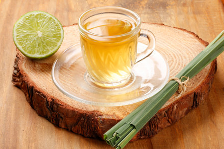 lemongrass tea in glass cup on bamboo tableの写真素材