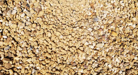 Texture of gravel stones on ground