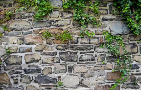 Texture of old stone wall - rock bricks background