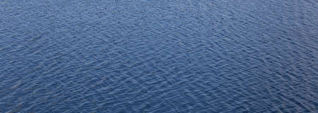 Texture of blue sea water surface backgroundの写真素材