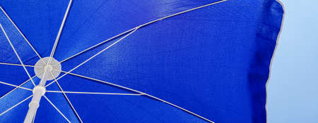 blue umbrella on a blue background
