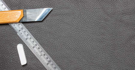 texture of black leather background with tools
