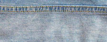 texture of light blue jeans denim fabric background