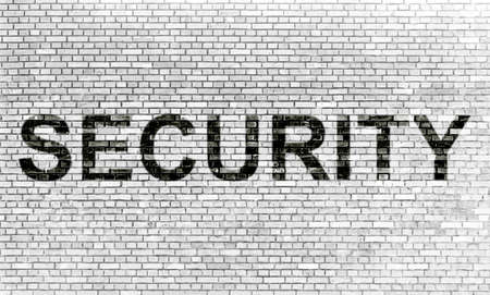 SECURITY on grunge brick wall backgroundの写真素材