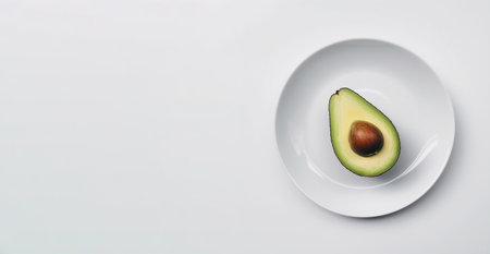 white plate with avocado on gray background. Created with Generative AIの素材