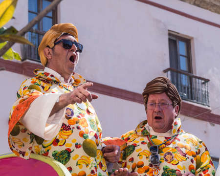 Cadiz, Spain - 3 March 2019: Many local residents dress up for the Cadiz carnival and spend the day singing funny songs on the streets of the city.のeditorial素材