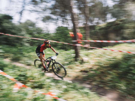 Cadiz, Spain - 24 March 2019: Participants of the third edition of the mountain bike championship. Photographs made with the sweeping technique.のeditorial素材