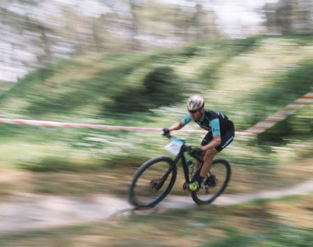Cadiz, Spain - 24 March 2019: Participants of the third edition of the mountain bike championship. Photographs made with the sweeping technique.のeditorial素材