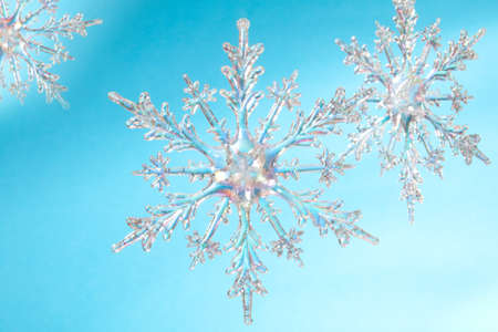 Snowflake shape, photo on the blue background