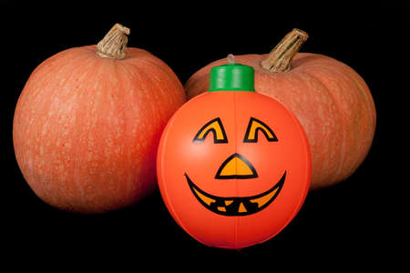 Halloween orange pumpkin - on blackの写真素材