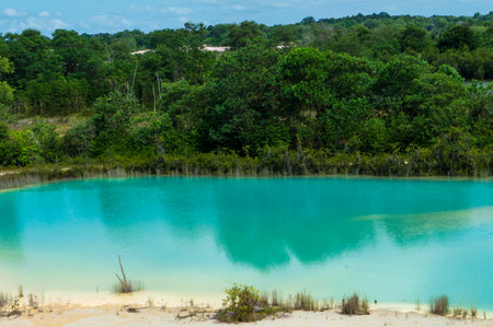 Blue turquoise lake in the national park of Belize.