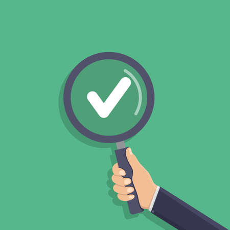 Business hand holding a magnifying glass, check mark, flat design vector illustrationのイラスト素材