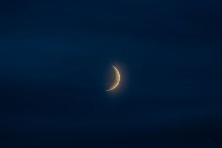 The moon in the night sky. The moon in the night sky.