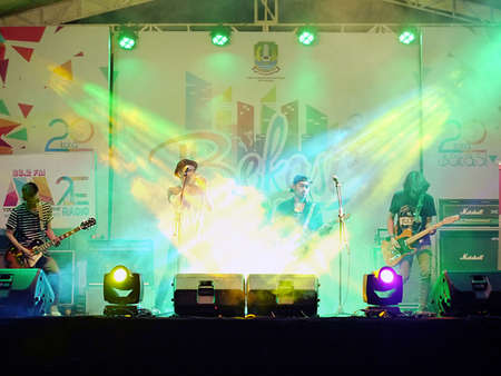 Local band on stage in Summarecon Bekasi, celebrating 20th town birthday.のeditorial素材
