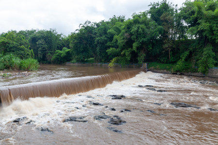 Water flow from the dam to the river in the rainy season.の写真素材