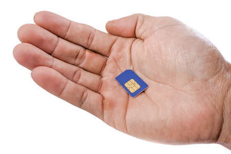 The right hand of an Indonesian man holds and shows a blue standard type sim card on a white backgroundの写真素材