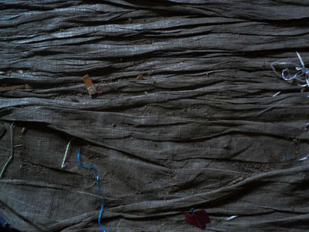 black tarpaulin in the form of an abstract floor