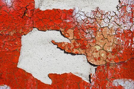 Blank background for your text. The texture of a grunge old street on the facade wall with cracked...