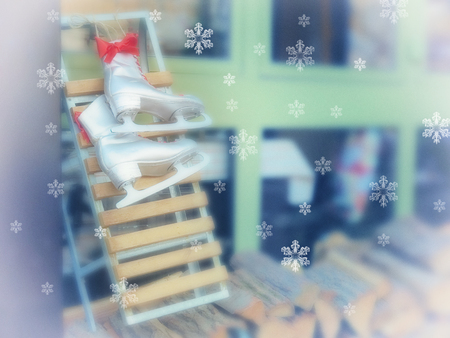 Beautiful Christmas decorative greeting card background. Winter ice skates. New Year