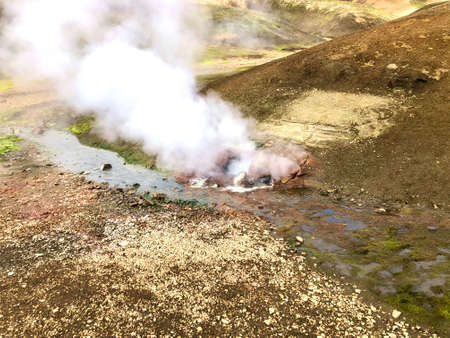 White fume near brook in countrysideの写真素材