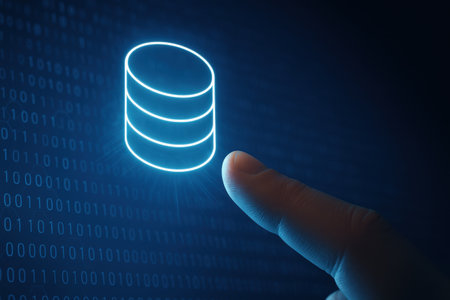 Businessman hand pointing at a blue coin icon on binary code backgroundの素材