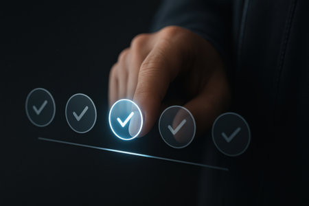 Businessman hand pressing check mark button on virtual screen with dark backgroundの素材