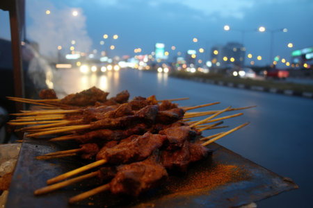 Grilled pork satay on the street at night, Thailand.の素材