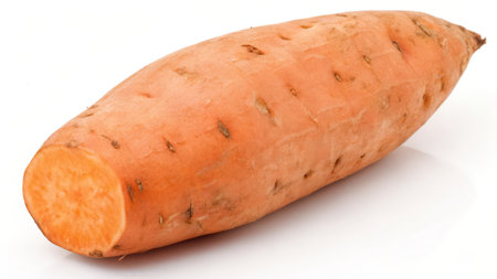 Fresh sweet potato isolated on white background. Clipping path included.の素材