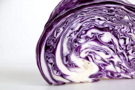 Purple cabbage on a white background. Shallow depth of field.の素材