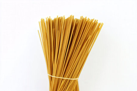 Bunch of spaghetti isolated on white background. Close-up.の素材