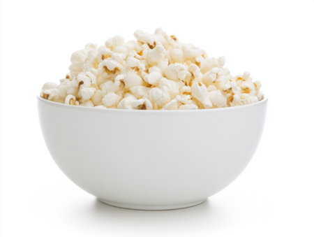 Popcorn in a white bowl isolated on white background, clipping path includedの素材