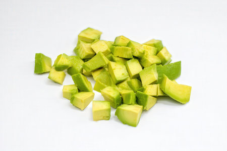 Avocado slices isolated on white background. Healthy food concept. Selective focus.の素材